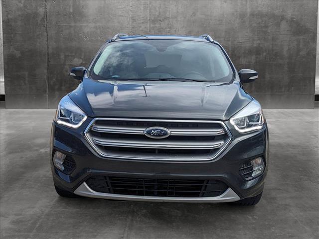 Used 2017 Ford Escape Titanium with VIN 1FMCU0J95HUF06938 for sale in Katy, TX