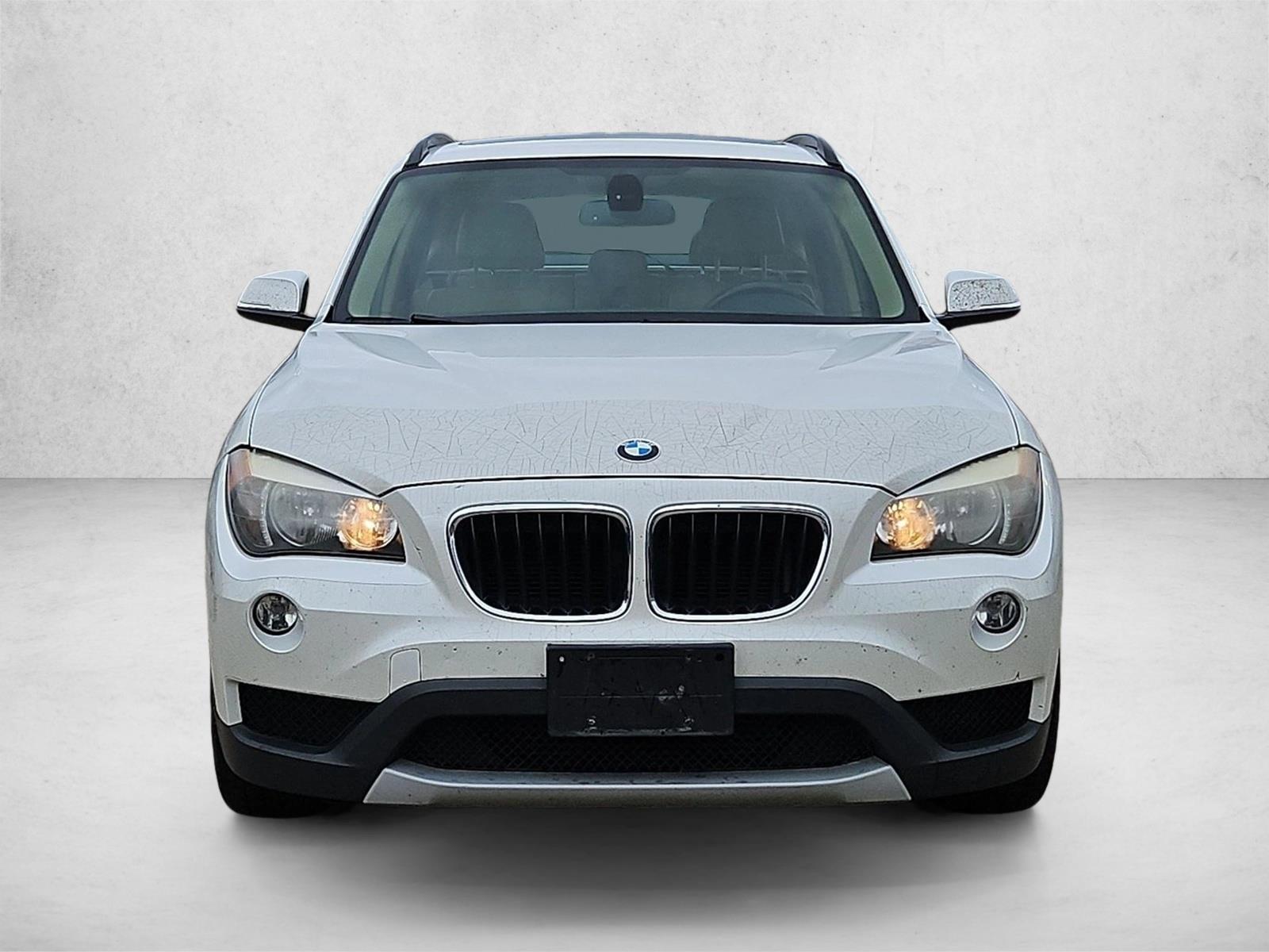 Used 2014 BMW X1 28i with VIN WBAVM1C57EVW49924 for sale in Katy, TX