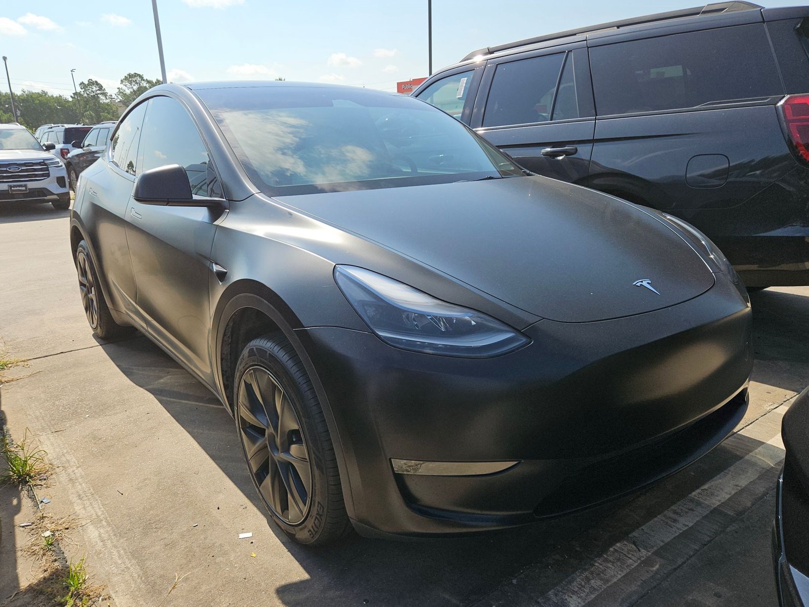 Used 2024 Tesla Model Y Long Range with VIN 7SAYGDED3RA308747 for sale in Katy, TX