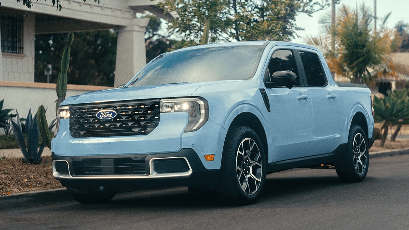 Ford Maverick parked outside a house