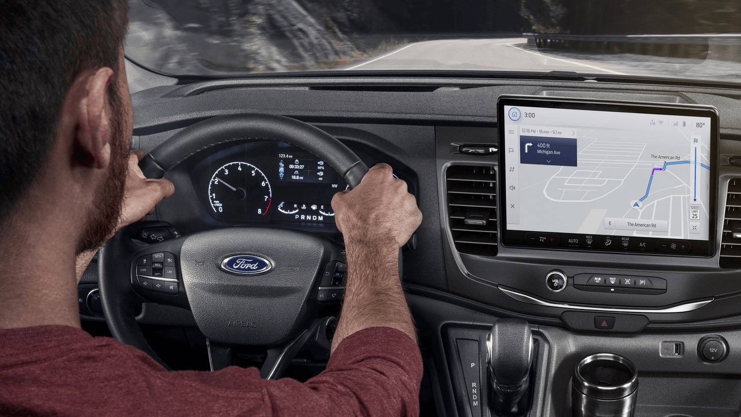 Learn about the Ford Transit Passenger Van Interior shot of the center console of the Ford Transit Passenger Van with the 12-inch touchscreen display