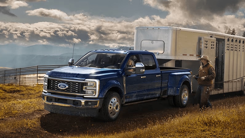 Exterior shot of Ford Super Duty F-350 towing an animal trailer