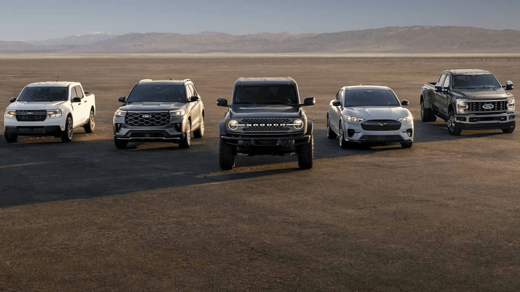 A lineup of Ford vehicles in a desert setting