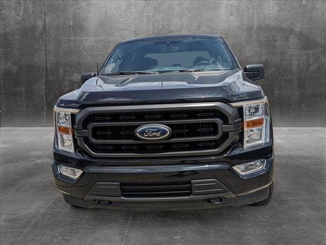 Used 2022 Ford F-150 XLT with VIN 1FTFW1E56NKD49808 for sale in Katy, TX