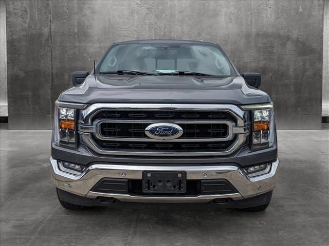 Used 2022 Ford F-150 XLT with VIN 1FTFW1E85NFB09202 for sale in Katy, TX