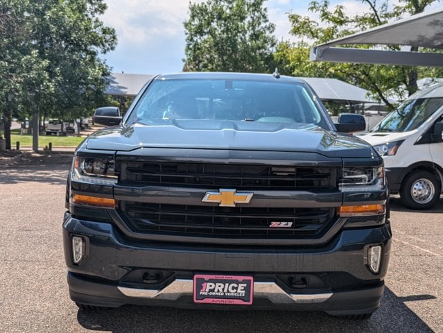 Used 2018 Chevrolet Silverado 1500 LT Z71 with VIN 3GCUKREC2JG242336 for sale in Littleton, CO