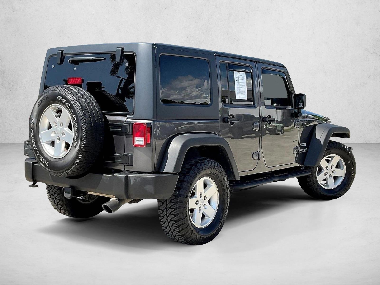 Used 2018 Jeep Wrangler JK Unlimited Sport S with VIN 1C4BJWDG9JL833909 for sale in Margate, FL