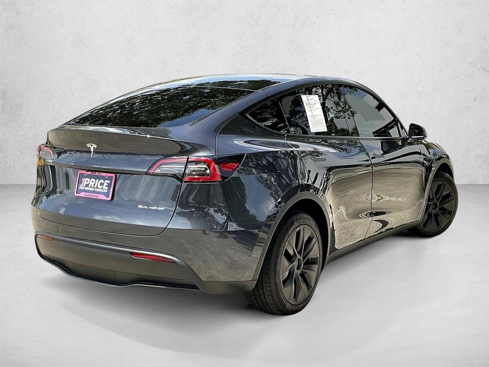 Used 2025 Tesla Model Y Long Range with VIN 7SAYGDEE4SF301470 for sale in Margate, FL