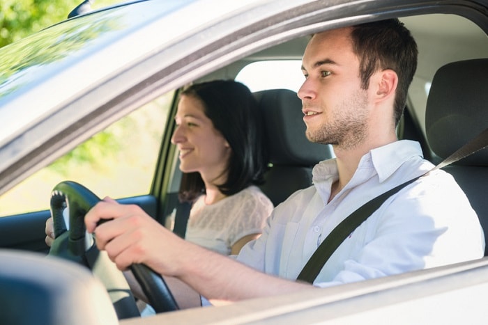 Sideview_Couple_Driving%20(1).jpg