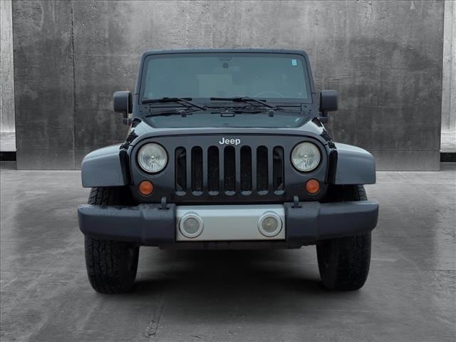 Used 2008 Jeep Wrangler Unlimited Sahara with VIN 1J4GA59118L572977 for sale in Memphis, TN