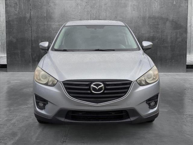 Used 2016 Mazda CX-5 Touring with VIN JM3KE2CY0G0666333 for sale in Miami Gardens, FL