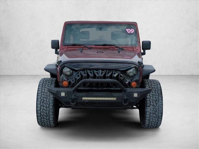 Used 2009 Jeep Wrangler Unlimited Sahara with VIN 1J4GA59199L788206 for sale in North Canton, OH