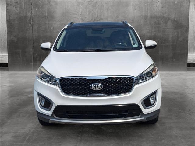 Used 2016 Kia Sorento EX with VIN 5XYPH4A56GG135061 for sale in Panama City, FL