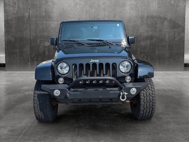 Used 2015 Jeep Wrangler Unlimited Sahara with VIN 1C4BJWEG6FL573474 for sale in Panama City, FL