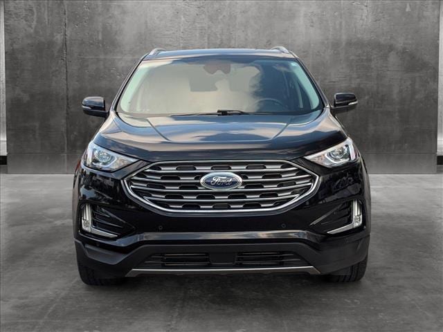 Used 2022 Ford Edge Titanium with VIN 2FMPK4K94NBA23827 for sale in Saint Petersburg, FL