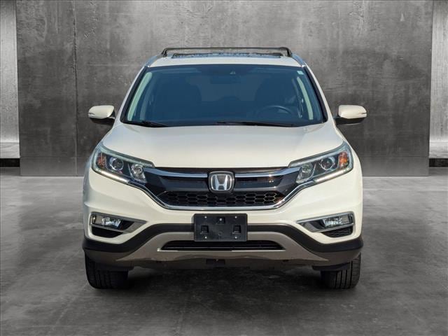 Used 2016 Honda CR-V Touring with VIN 5J6RM4H90GL000847 for sale in Saint Petersburg, FL