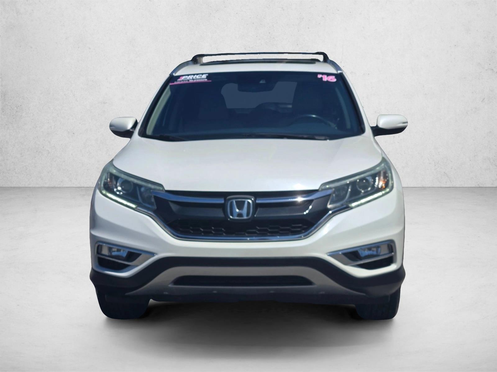Used 2016 Honda CR-V Touring with VIN 5J6RM3H91GL000673 for sale in St. Petersburg, FL