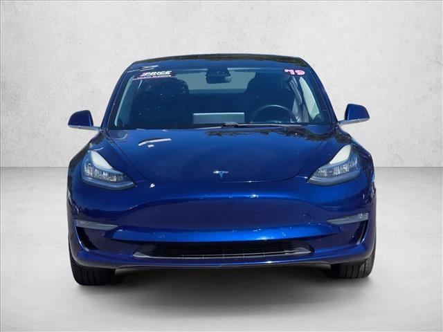 Used 2019 Tesla Model 3 Base with VIN 5YJ3E1EA1KF396594 for sale in St. Petersburg, FL