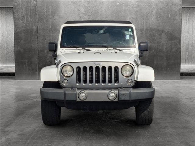 Used 2014 Jeep Wrangler Unlimited Freedom Edition with VIN 1C4HJWDG3EL198508 for sale in Saint Petersburg, FL