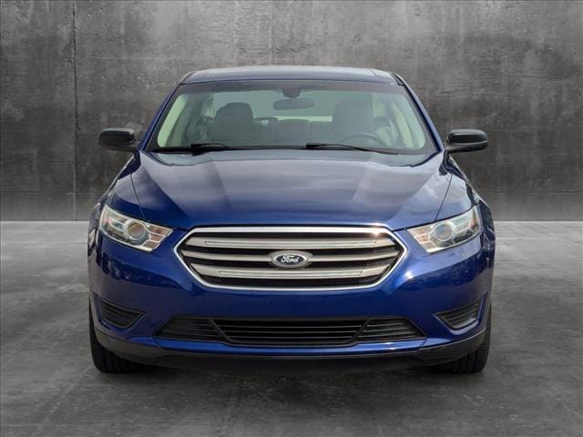 Used 2015 Ford Taurus SE with VIN 1FAHP2D84FG183743 for sale in Saint Petersburg, FL