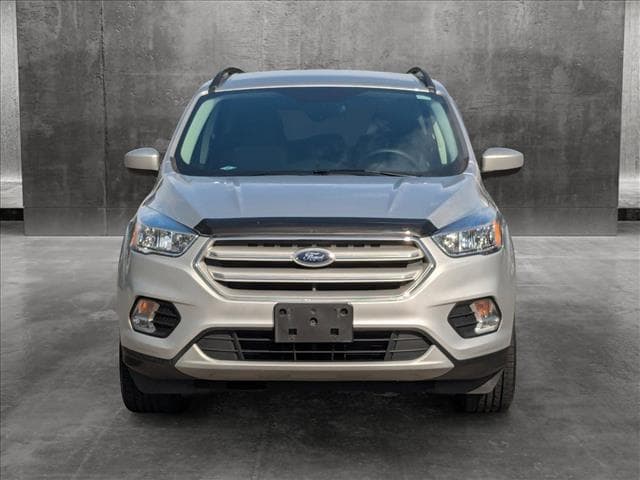 Used 2018 Ford Escape SE with VIN 1FMCU9GD7JUA29127 for sale in Saint Petersburg, FL