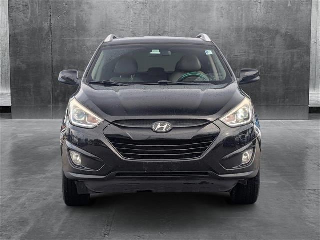 Used 2014 Hyundai Tucson SE with VIN KM8JU3AG2EU868860 for sale in Saint Petersburg, FL