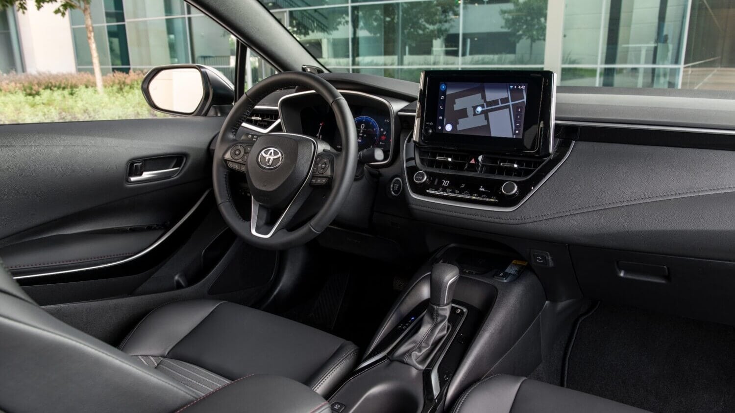 Interior%202.jpg The steering wheel and center console of the Toyota Corolla