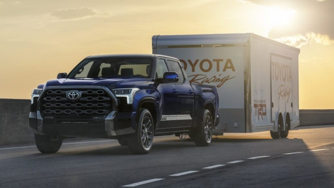 Toyota Tundra towing a Toyota Racing-branded trailer