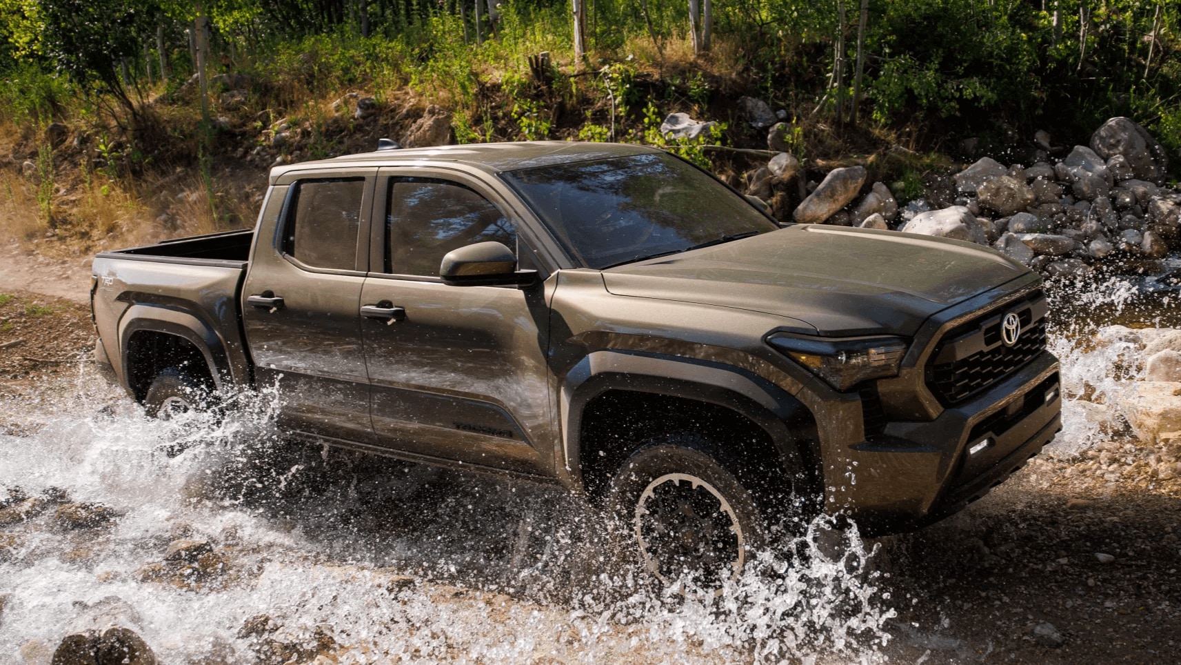 Learn about the lifting options for the Toyota Tacoma Toyota Tacoma TRD Off-Road traveling through a body of water