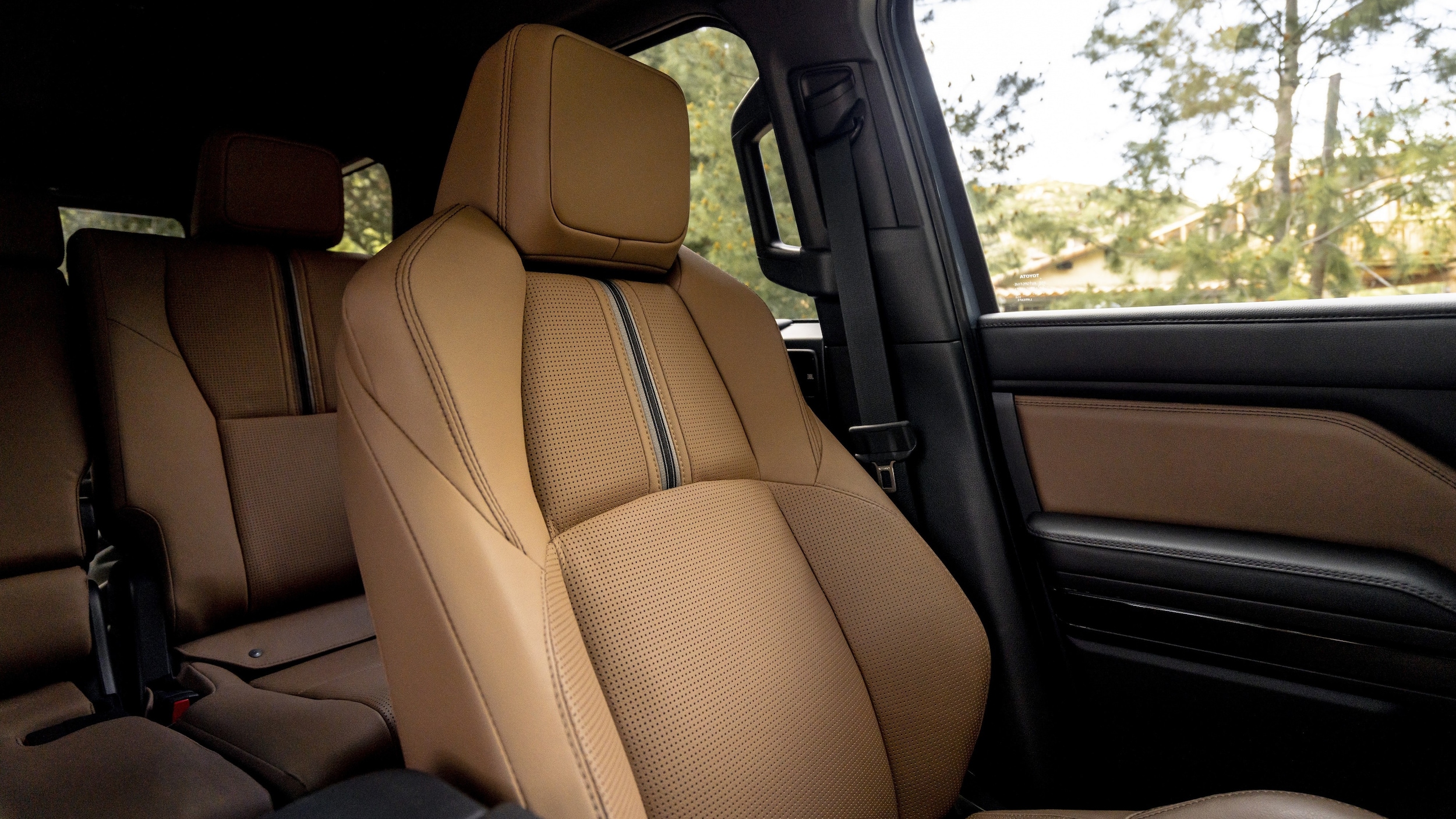 Interior%202(1).jpg The leather driver's seat and a glimpse of the back seats in the Toyota 4Runner