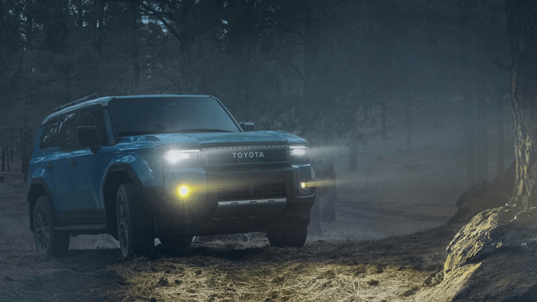 Learn about the exterior features of the Toyota Land Cruiser Night time shot of the Land Cruiser with headlights and fog lights turned on