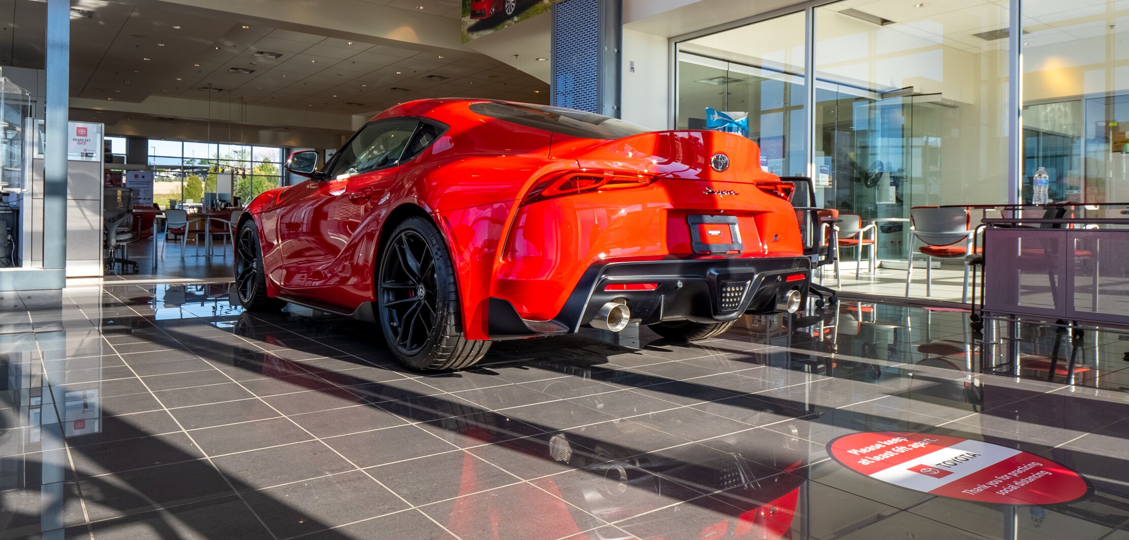 Find out about buying, servicing, and financing Toyota vehicles at AutoNation Toyota Arapahoe Red Toyota parked in the lobby of AutoNation Toyota Arapahoe