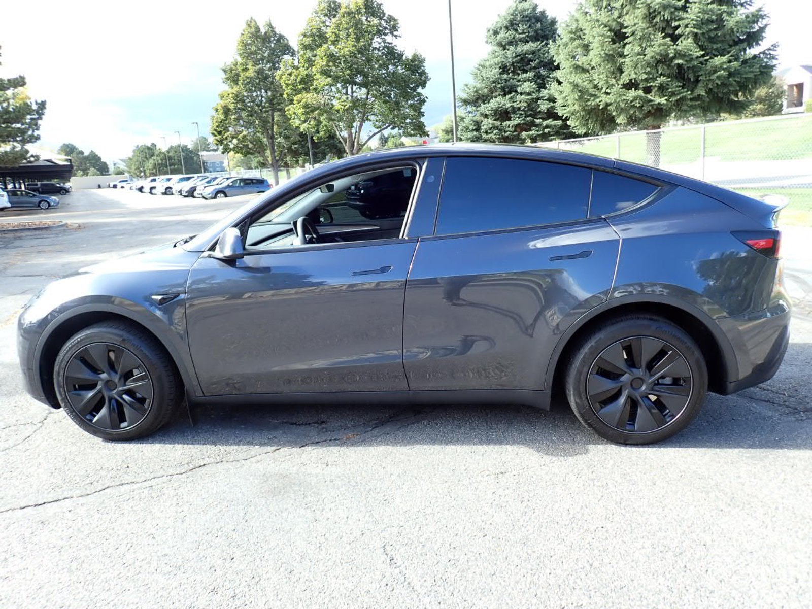 Used 2025 Tesla Model Y Long Range with VIN 7SAYGDED7SF259352 for sale in Centennial, CO