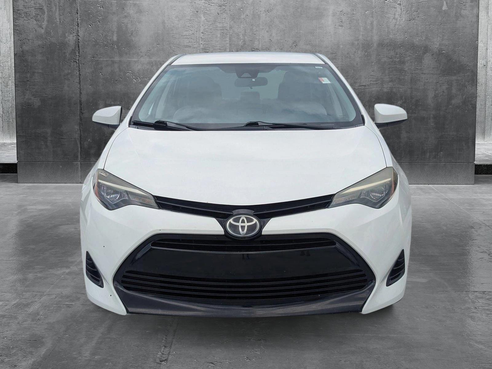 Used 2018 Toyota Corolla LE with VIN 5YFBURHE2JP765185 for sale in Fort Myers, FL