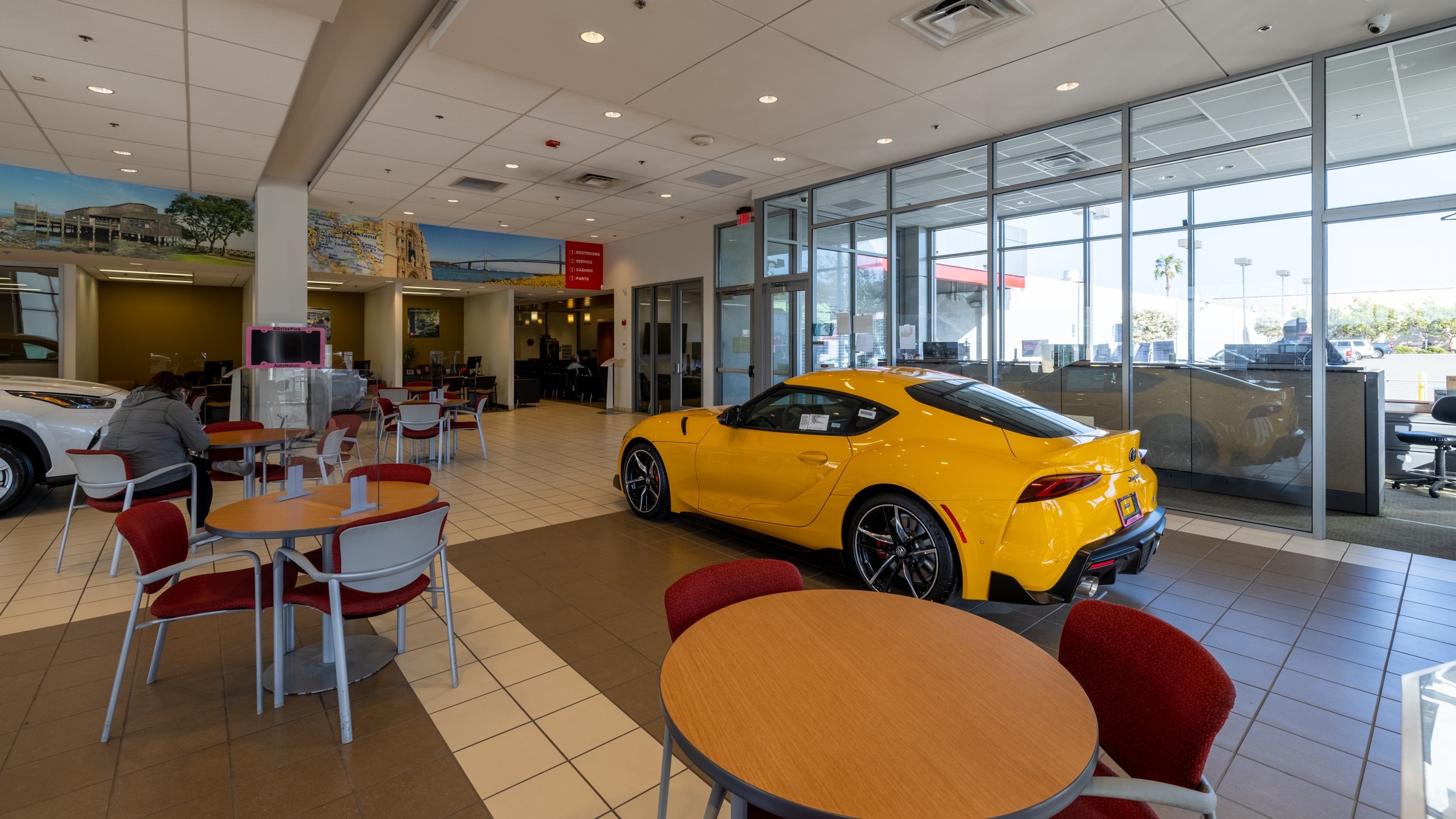 Yellow Toyota parked in the lobby of AutoNation Toyota Hayward