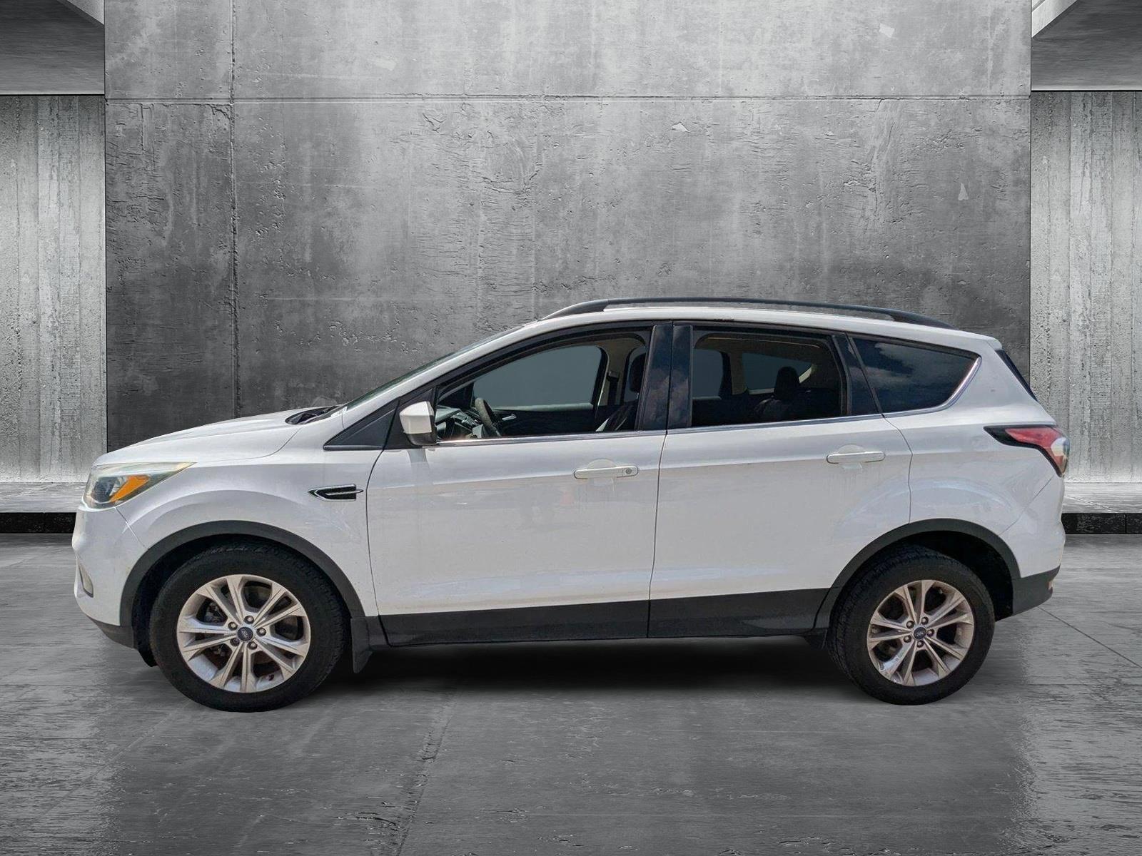 Used 2018 Ford Escape SE with VIN 1FMCU9GD0JUA69419 for sale in Pinellas Park, FL