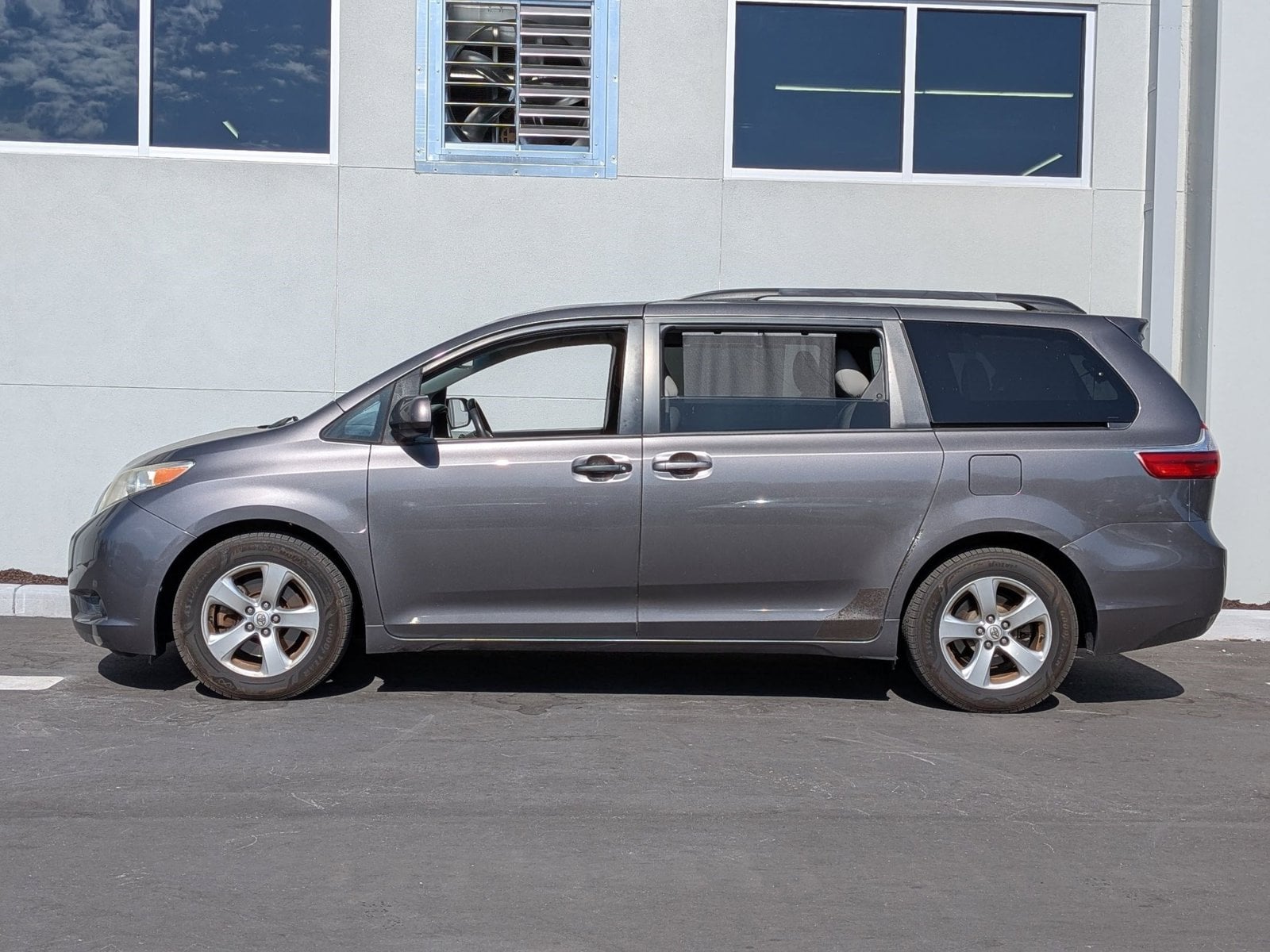 Used 2015 Toyota Sienna LE with VIN 5TDKK3DC6FS615960 for sale in Pinellas Park, FL