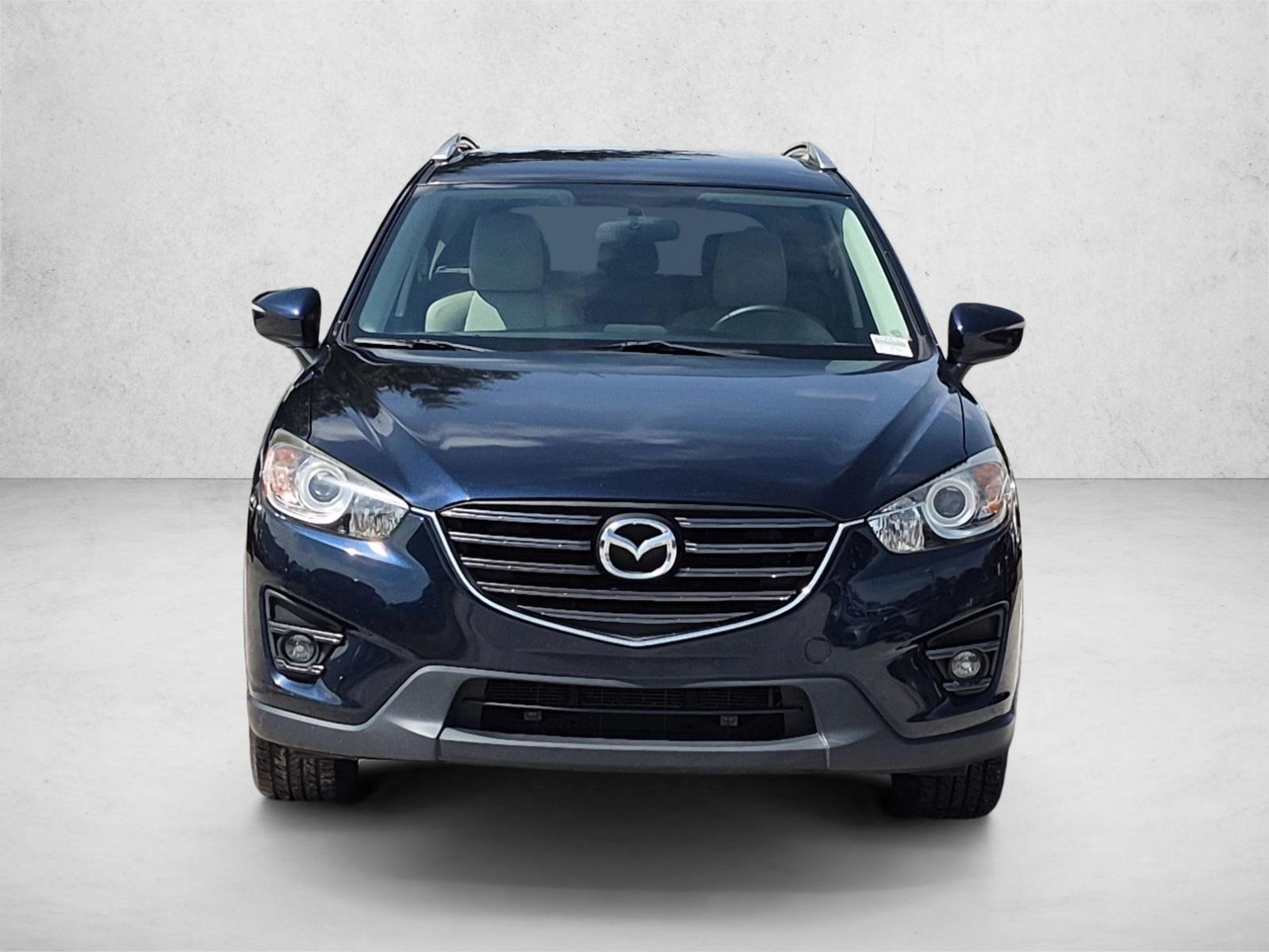 Used 2016 Mazda CX-5 Touring with VIN JM3KE2CY7G0790812 for sale in Pinellas Park, FL