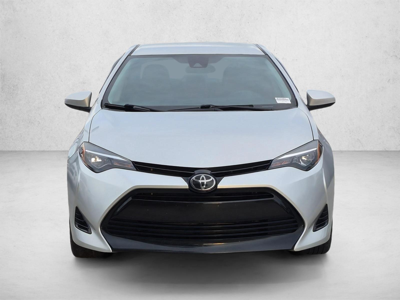 Used 2018 Toyota Corolla LE with VIN 5YFBURHE2JP855663 for sale in Pinellas Park, FL