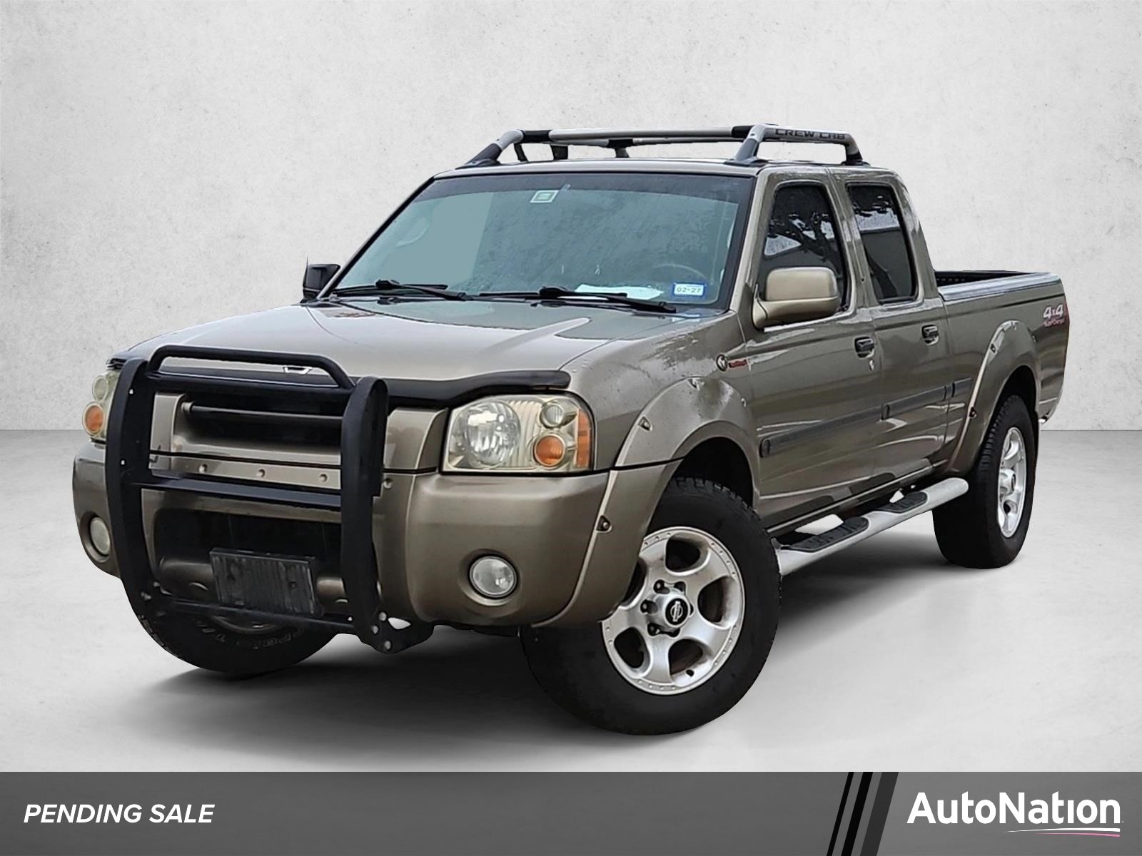 2002 Nissan Frontier SC 4X4 Crew Cab V6 4AT Long Bed's photo