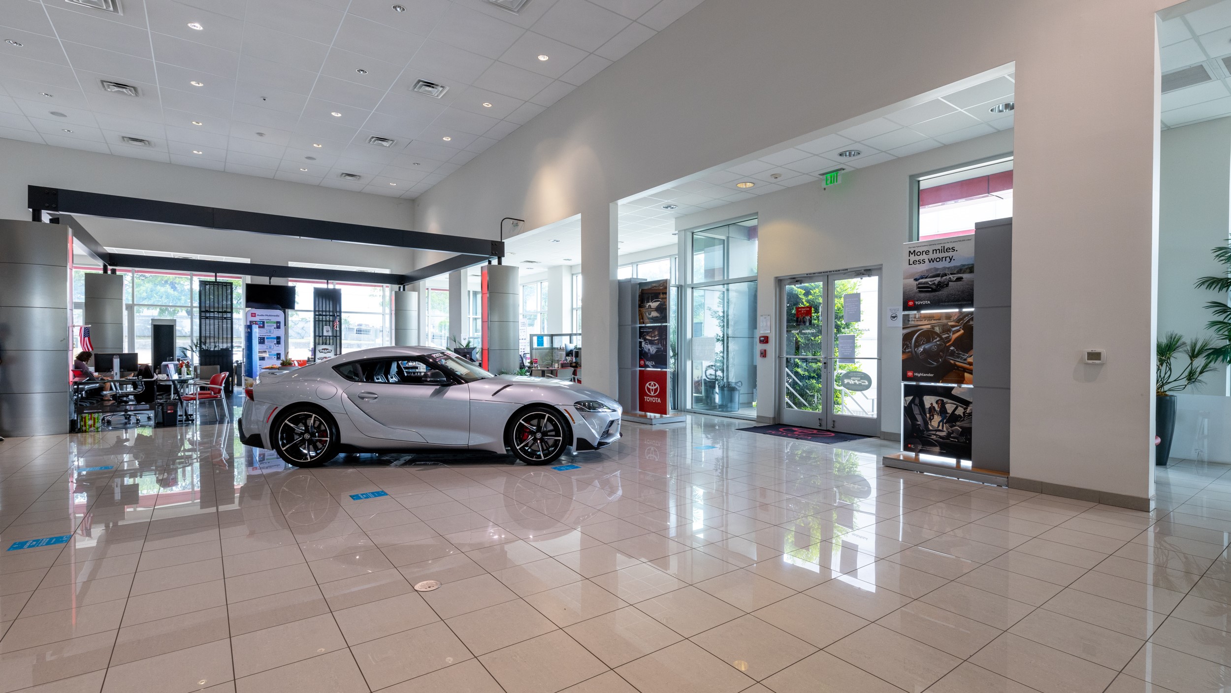 Silver Toyota parked inside lobby at AutoNation Toyota South Austin