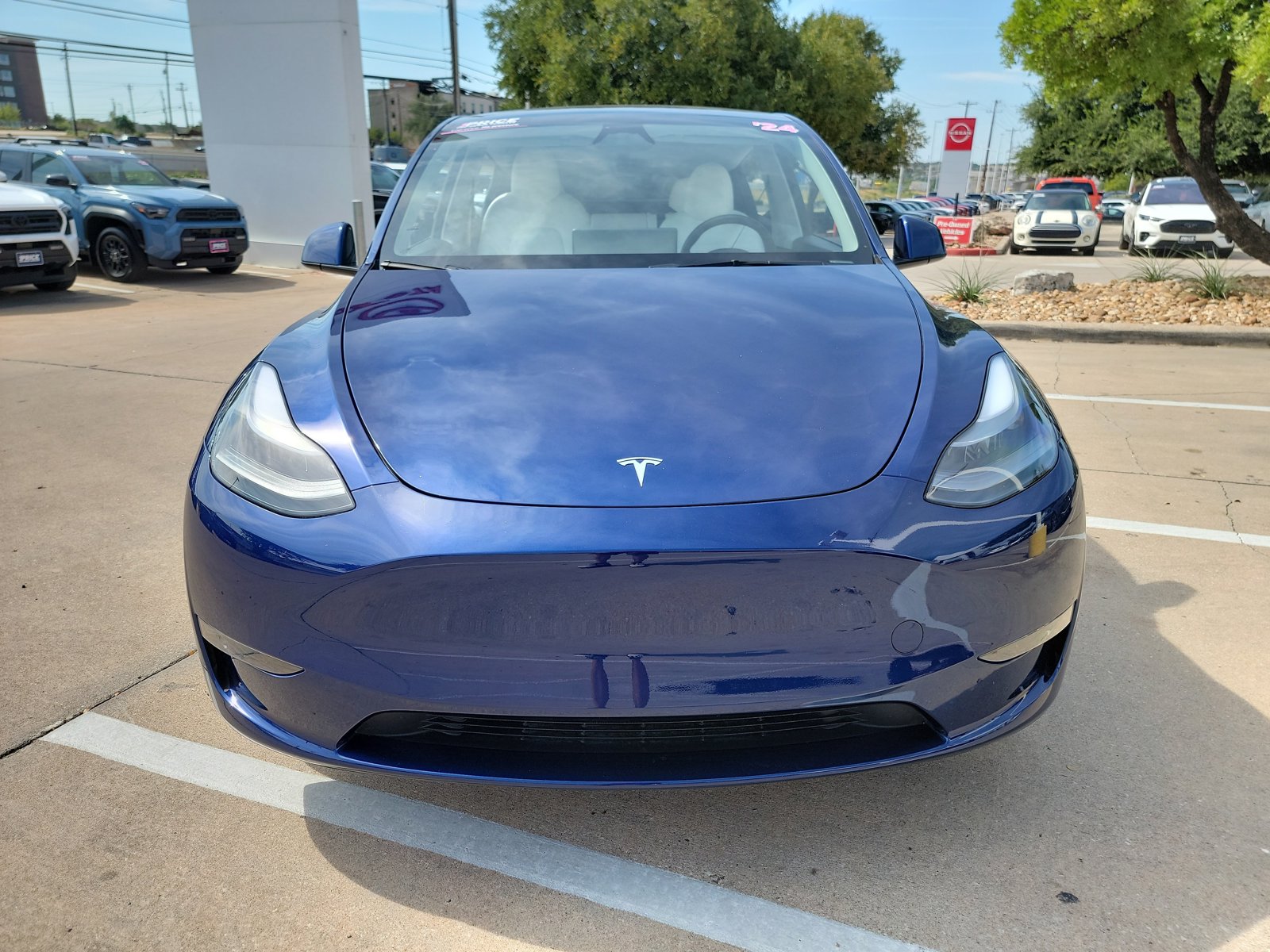 Used 2024 Tesla Model Y Long Range with VIN 7SAYGDEE3RA221374 for sale in Northfield, Minnesota