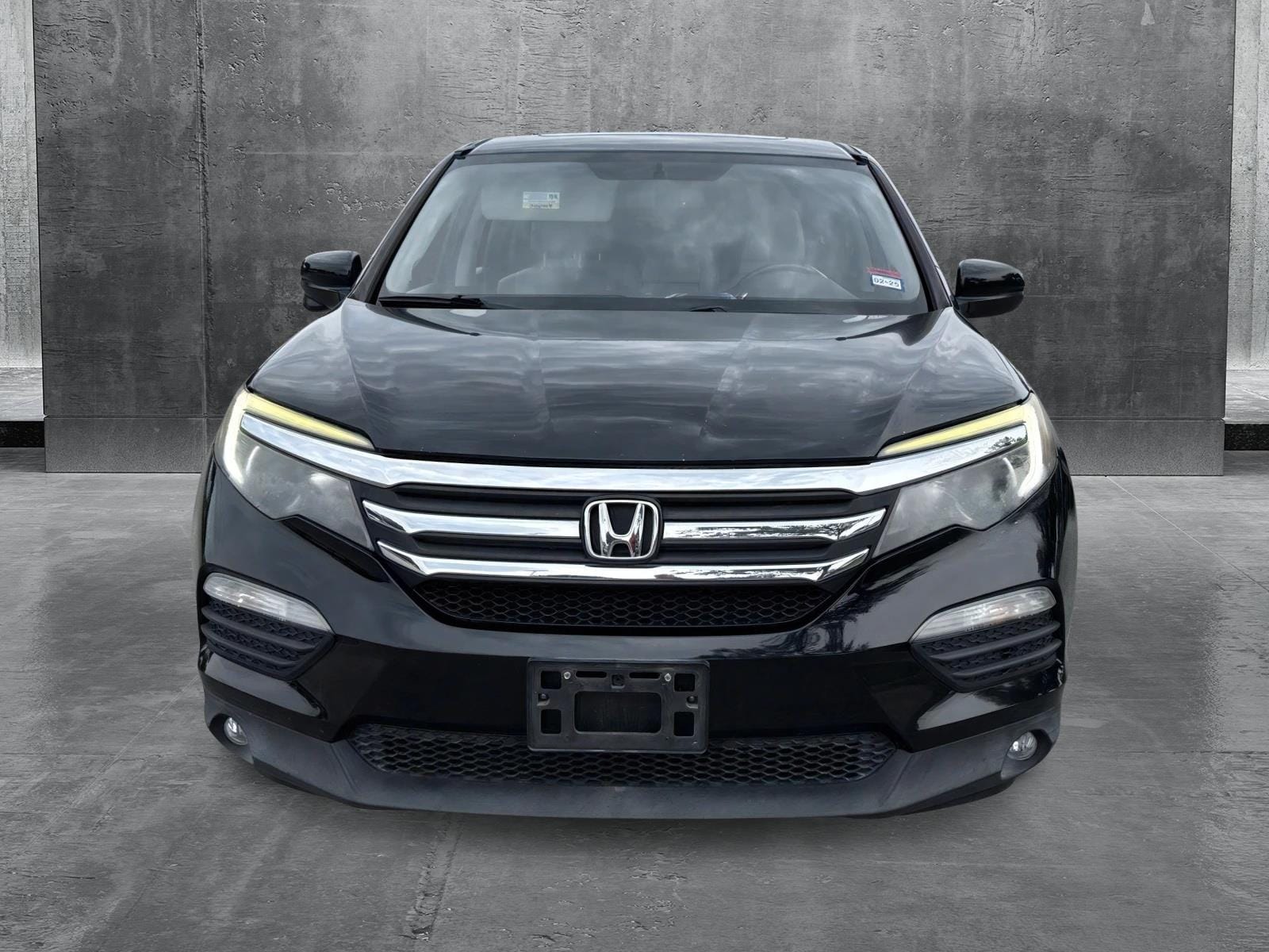 Used 2016 Honda Pilot EX-L with VIN 5FNYF5H56GB009344 for sale in Austin, TX
