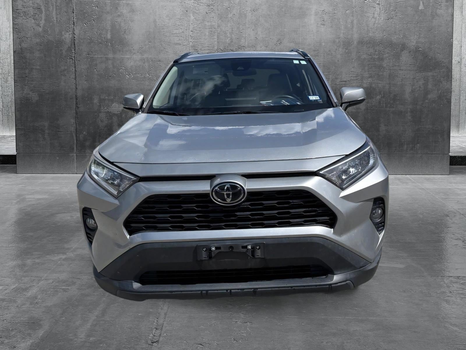 Used 2021 Toyota RAV4 XLE Premium with VIN 2T3C1RFV8MC169428 for sale in Northfield, Minnesota