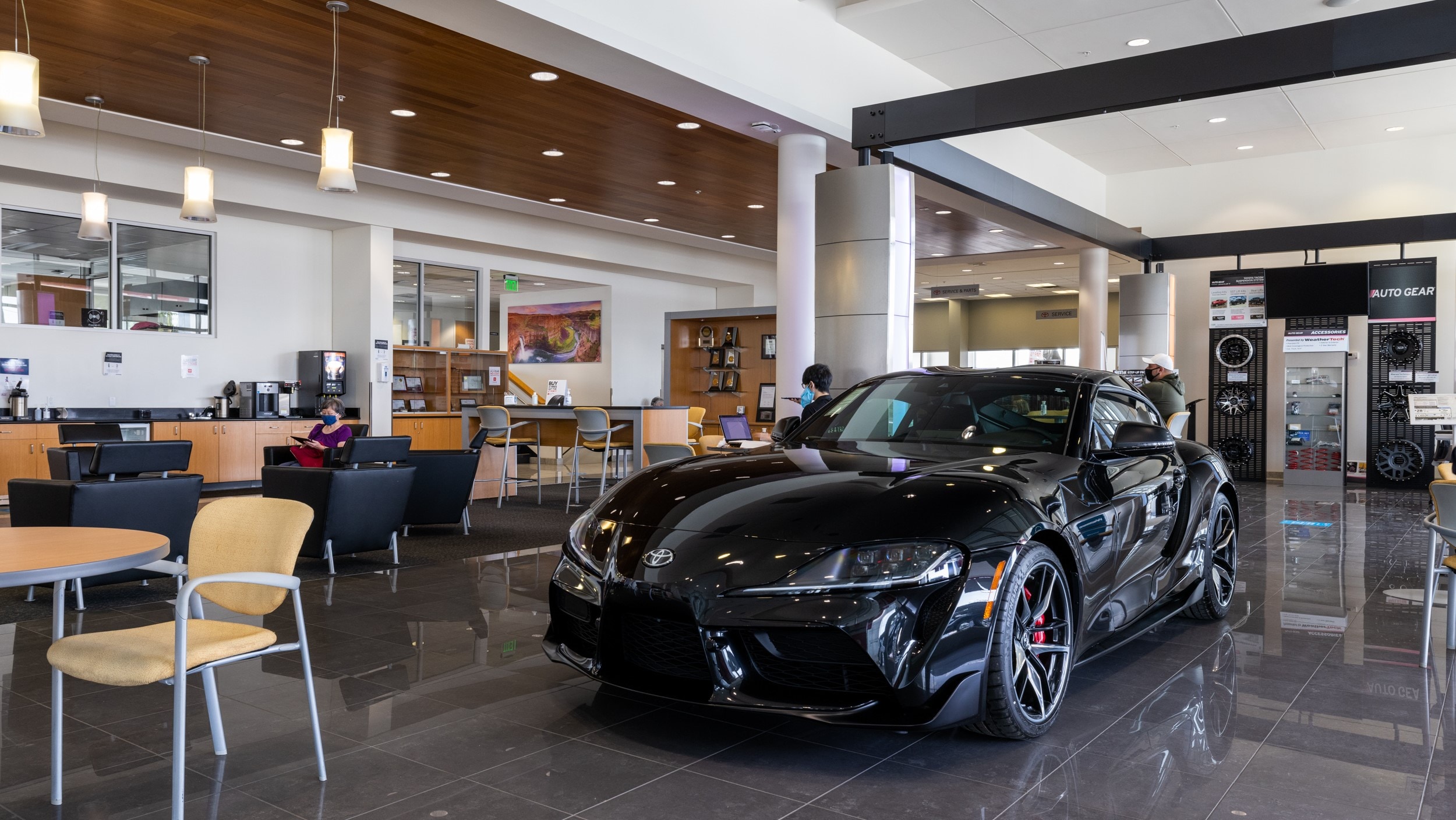 Find out about buying, servicing, and financing Toyota vehicles at AutoNation Toyota Spokane Valley Black Toyota parked in the lobby of AutoNation Toyota Spokane Valley