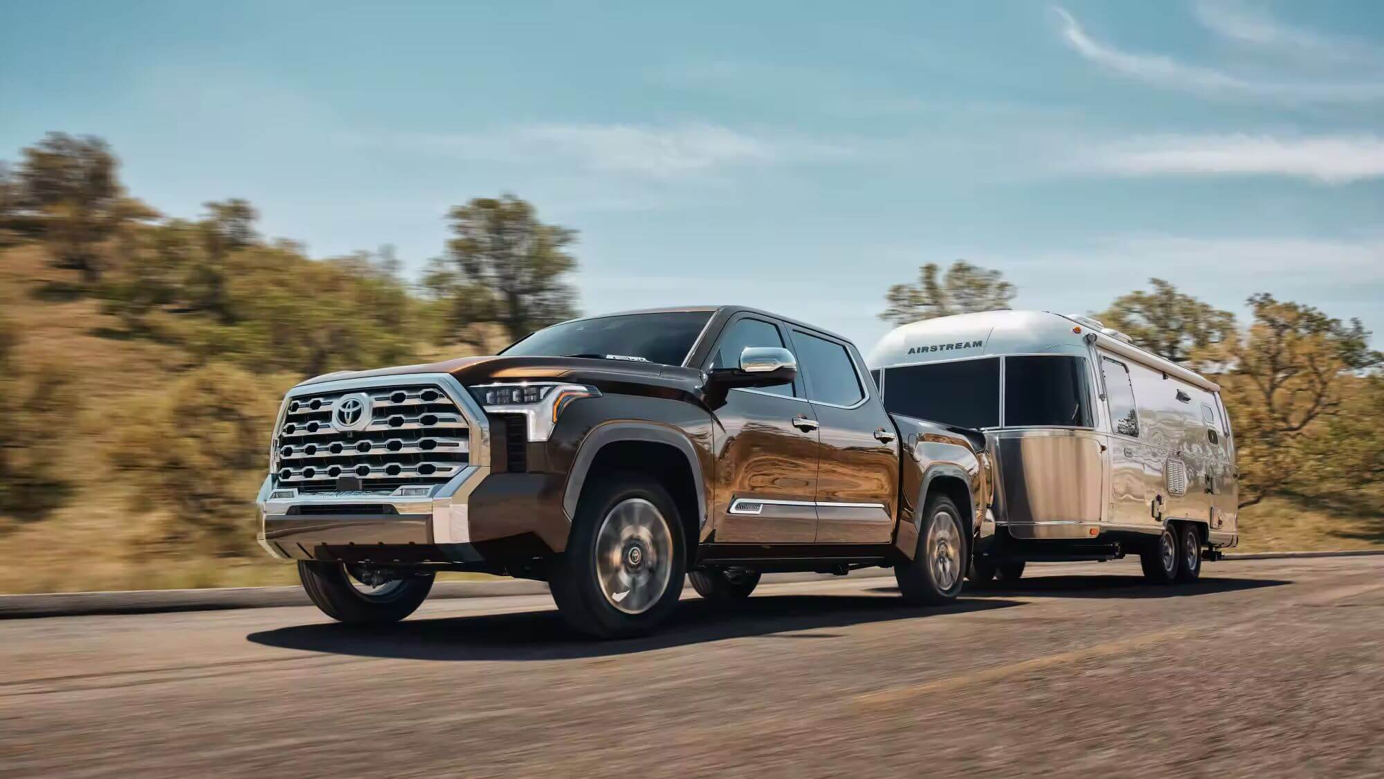 Learn about the payload and towing capacities of the Toyota Tundra Toyota Tundra 1794 Edition CrewMax shown in Smoked Mesquite