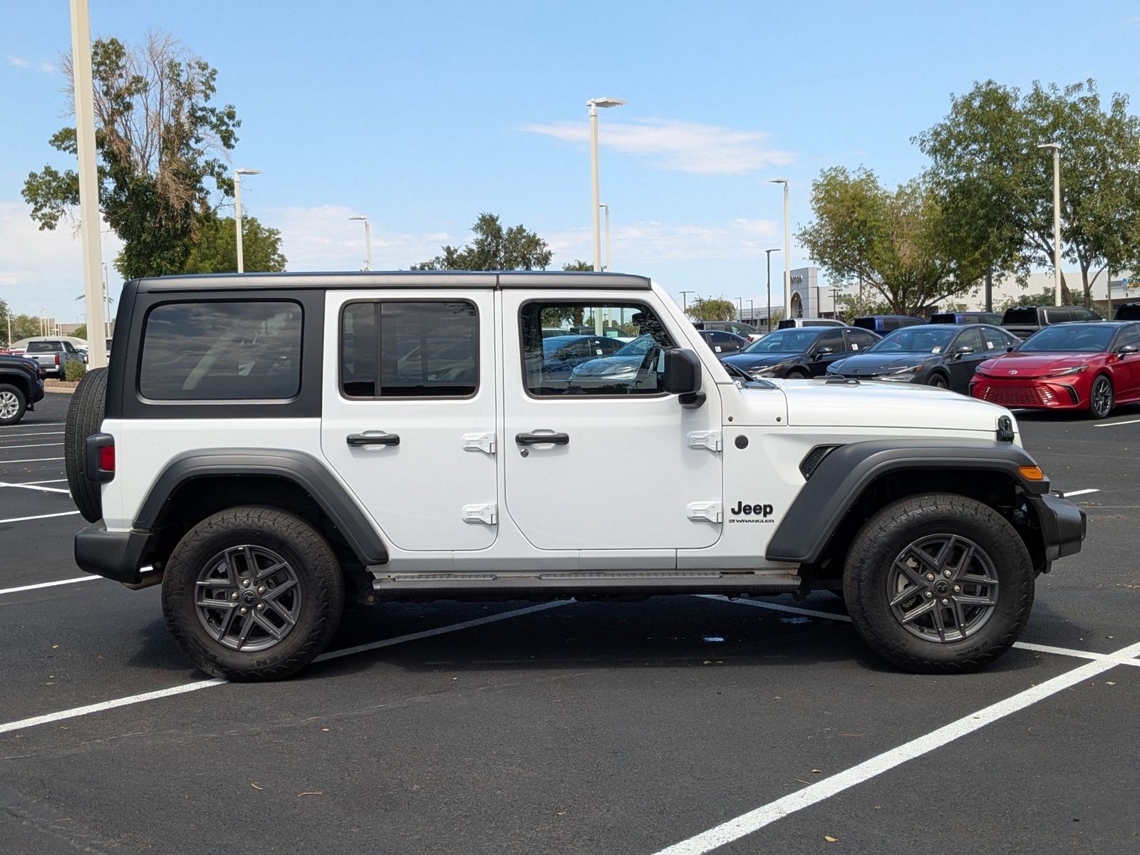 2024 Jeep Wrangler Sport S photo 2
