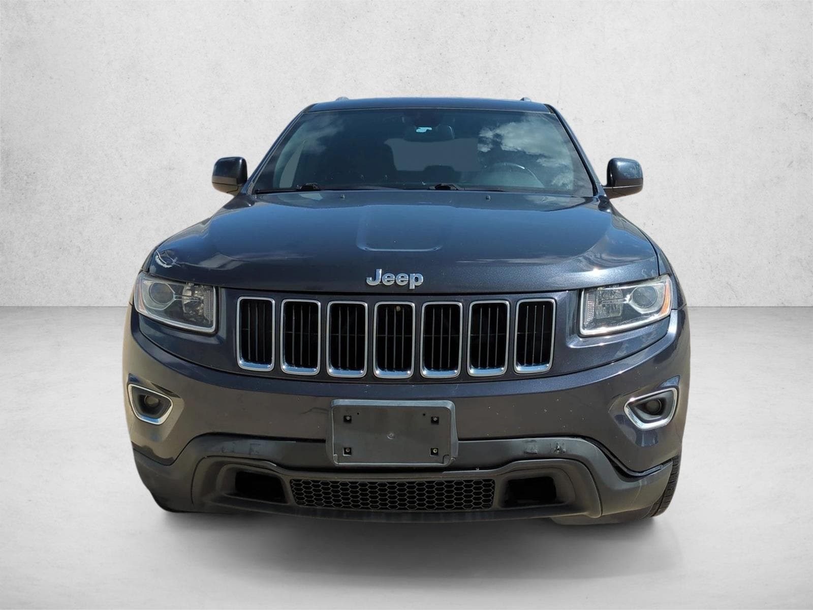 Used 2016 Jeep Grand Cherokee Laredo E with VIN 1C4RJEAG5GC422576 for sale in Winter Park, FL