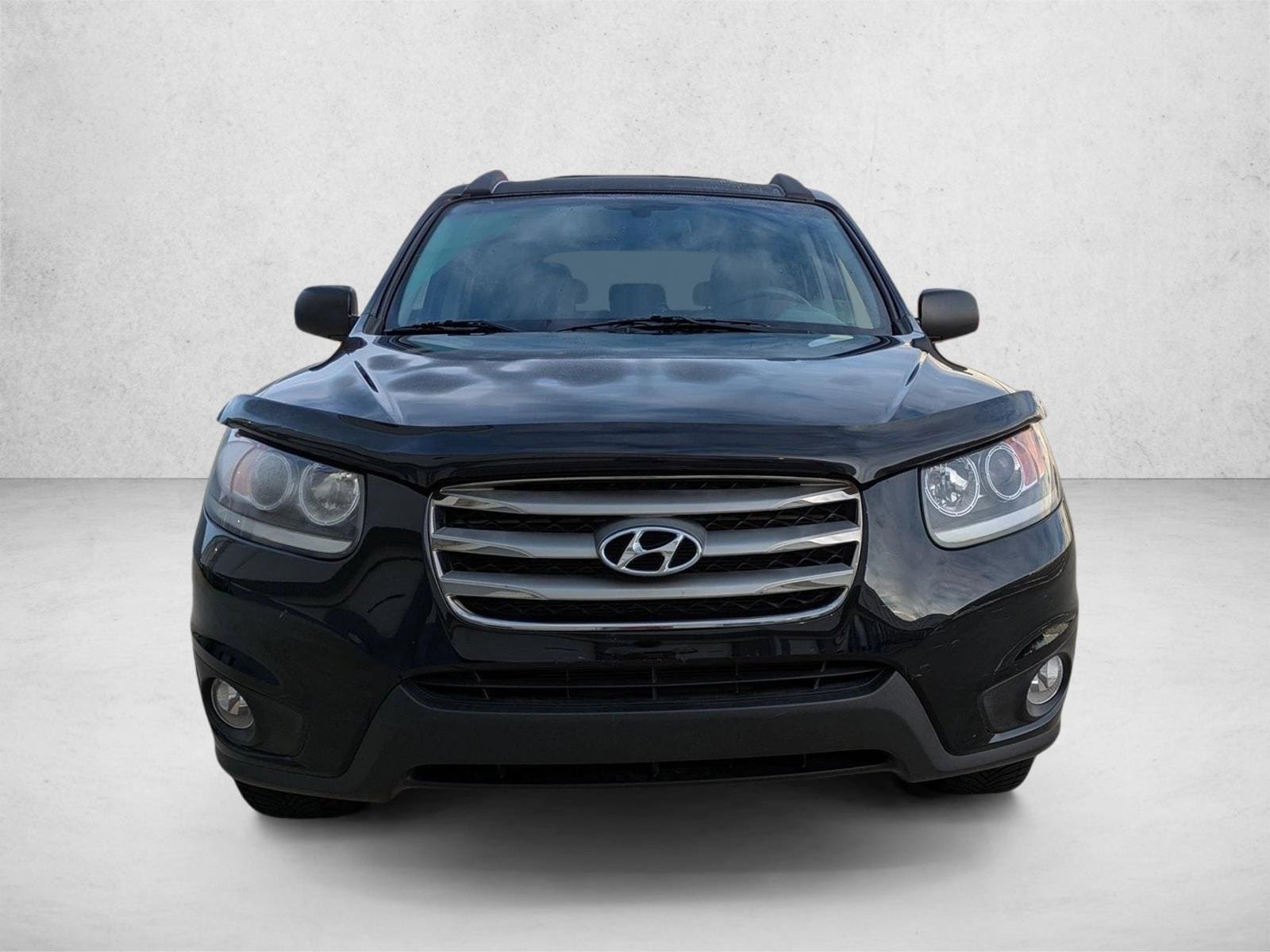 Used 2012 Hyundai Santa Fe GLS with VIN 5XYZG4AG9CG168093 for sale in Winter Park, FL