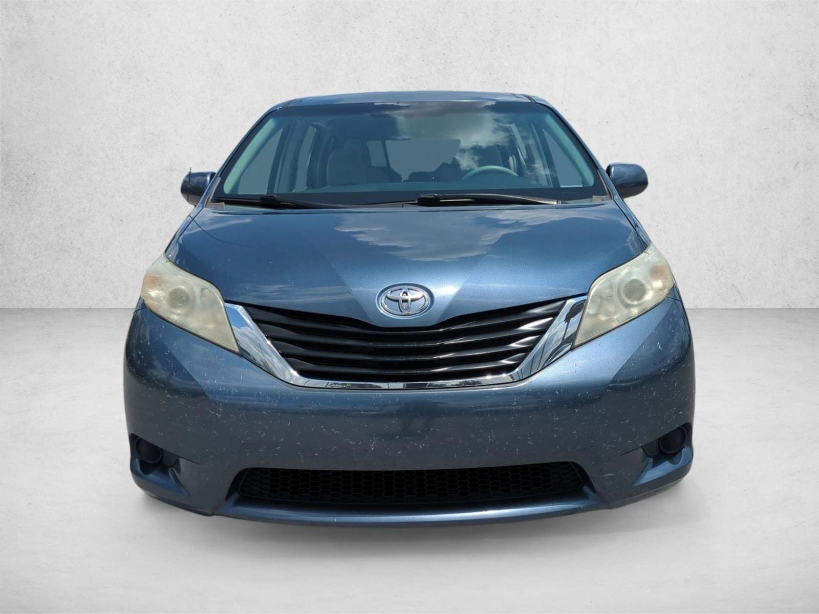 Used 2014 Toyota Sienna LE with VIN 5TDKK3DC7ES439290 for sale in Winter Park, FL